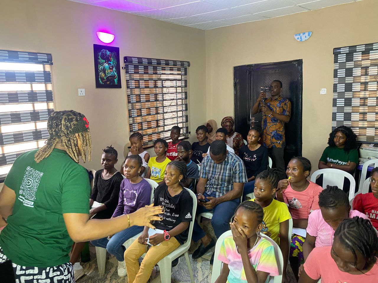 Community outreach — smiling youth at an event